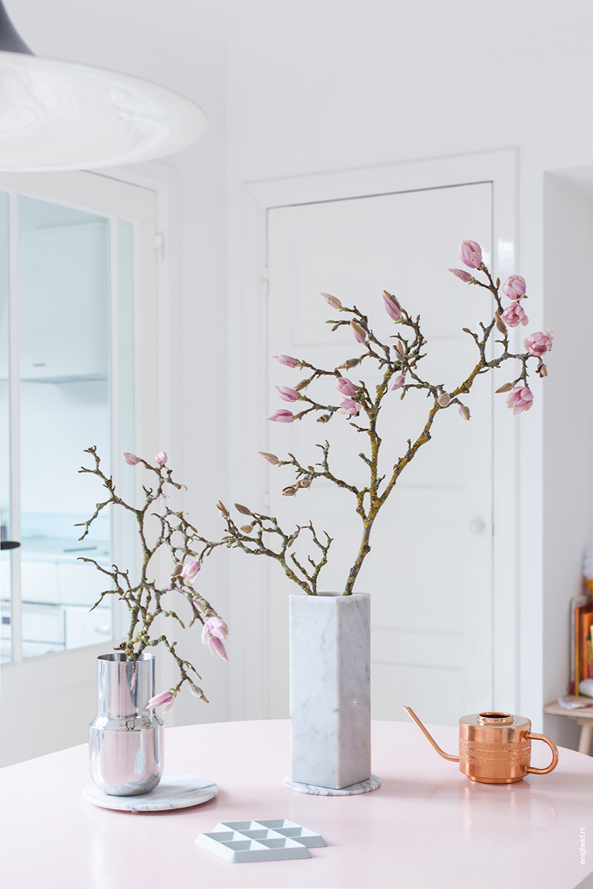 Magnolia branches in tactile vase by Menu design and marble vintage vase. | Enigheid