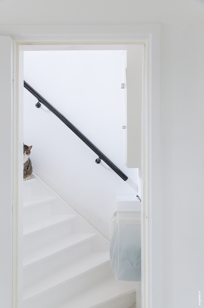 Hallway in the home of Iris Vank, with Aart Staartjes on the stairs | Enigheid