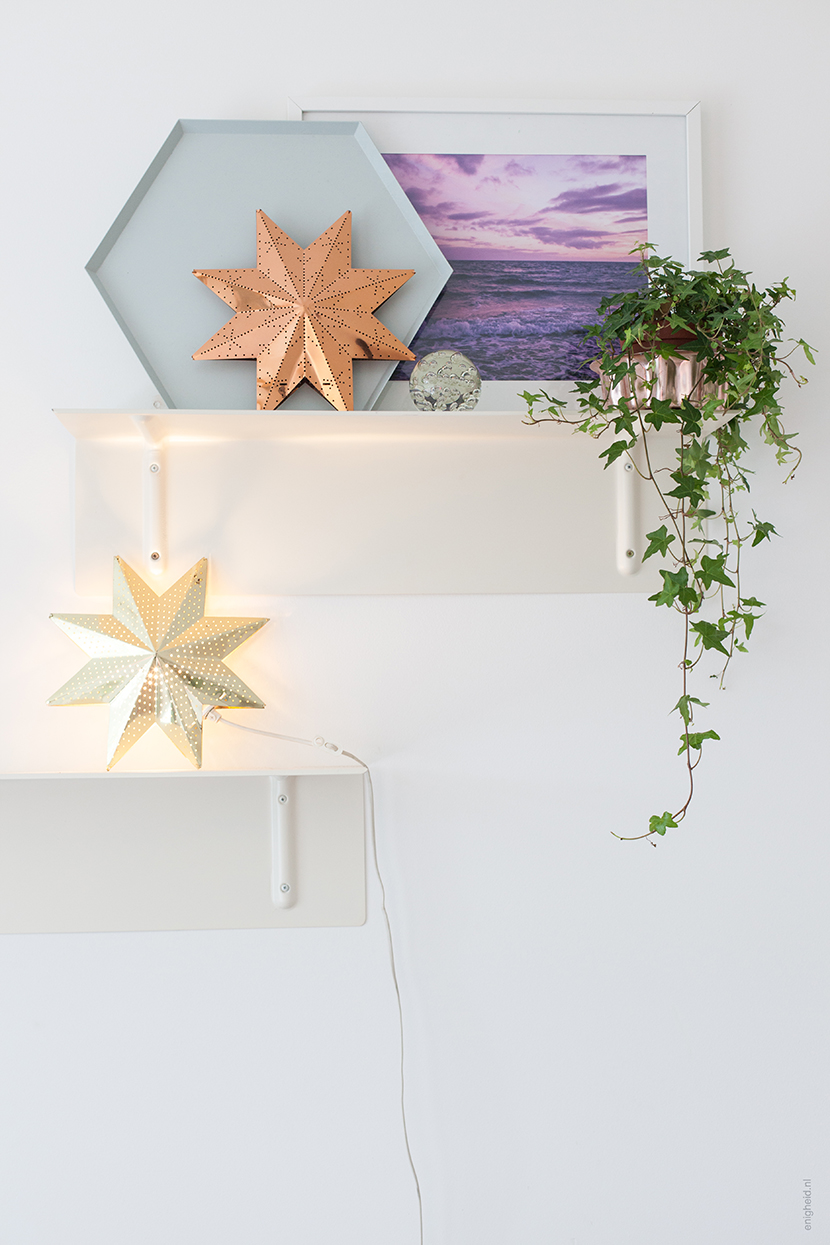 The front room of my pastel living room, with vintage lamp and stars, the picture I made of the sea in Denmark on a Hay bracket. | Enigheid