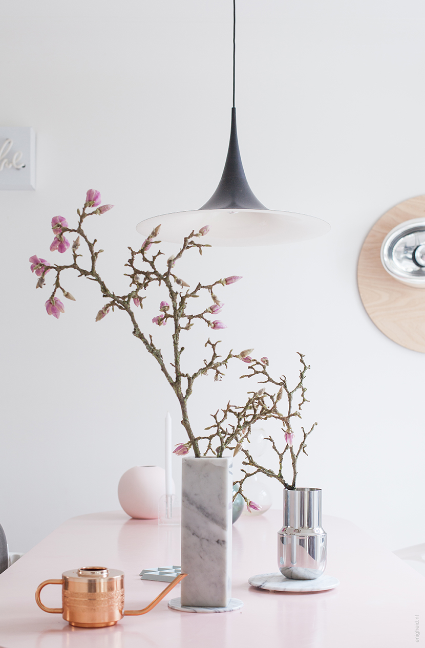 Magnolia branches in tactile vase by Menu design and marble vintage vase | Enigheid