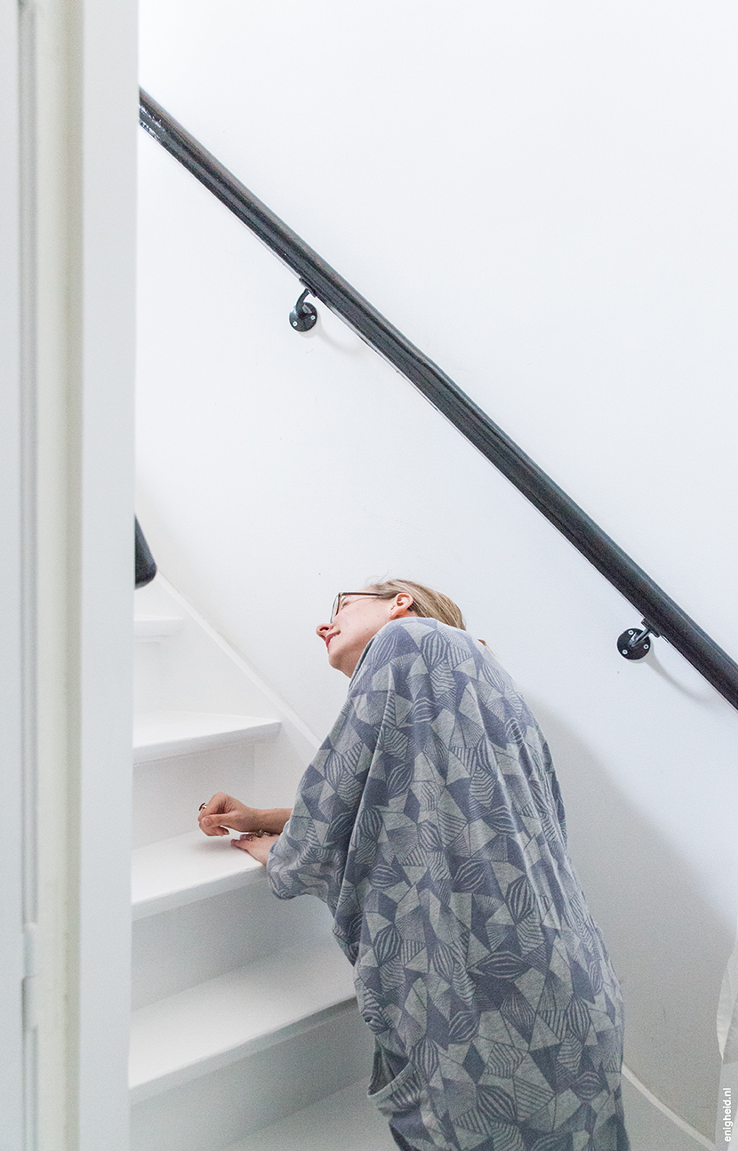 Hallway in the home of Iris Vank, with Aart Staartjes and Iris on the stairs | Enigheid